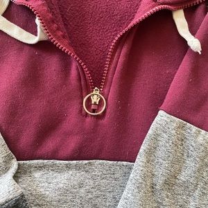 Womens Maroon hooded sweatshirt. This does run small.